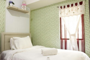 Spacious and Stylish 1BR Gateway Ahmad Yani Cicadas Apartment By Travelio